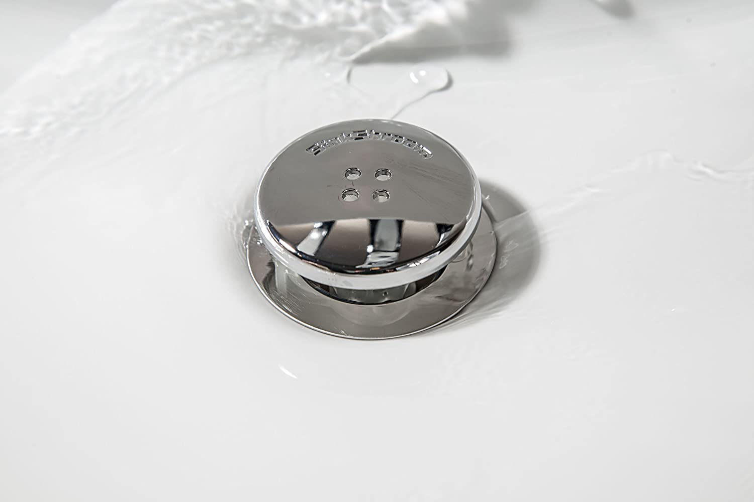 The chrome SinkShroom installed in a bathroom sink